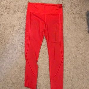 Women’s UnderArmour coral size large leggings